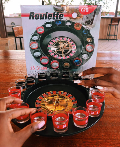 Juego de ruleta para beber con 16 vasos de shot y copas de vino, ideal para fiestas y reuniones.